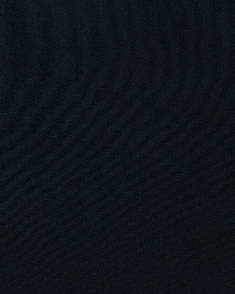 Close up of the custom oxford polo shirt for men by Luxire in soft midnight blue
