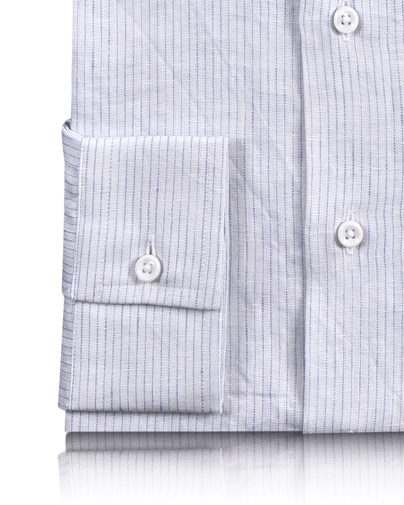 Cuff of the custom linen shirt for men in white with thin blue stripes by Luxire Clothing